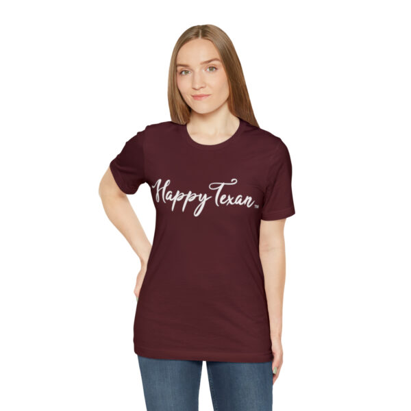 A woman wearing a maroon Bella+Canvas 3001 Womens Jersey Short Sleeve Tee that says happy tees.