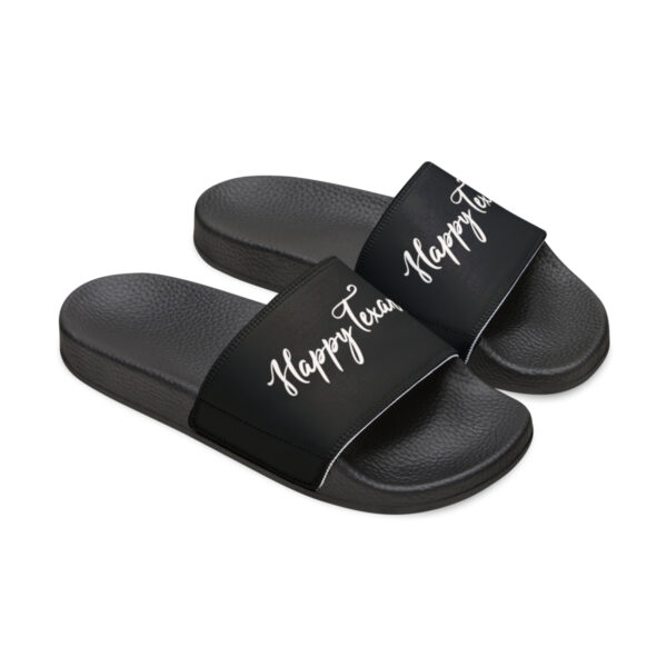 A pair of black sandals with the words happy tears written on them.