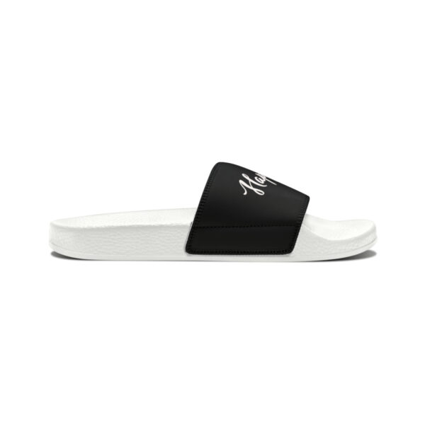 A pair of white and black slides on top of a white background.