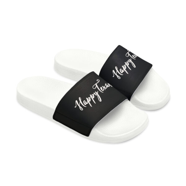 A pair of white and black sandals with the words " happy tears ".