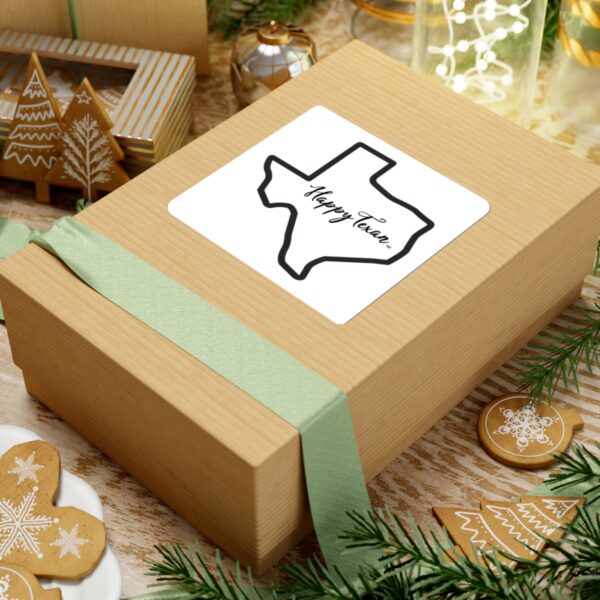 A box with a sticker on it that says happy texas.