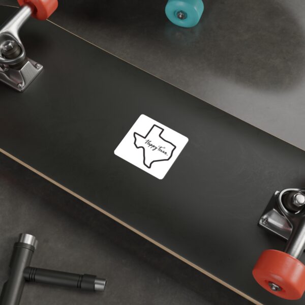 A skateboard with the texas state logo on it.