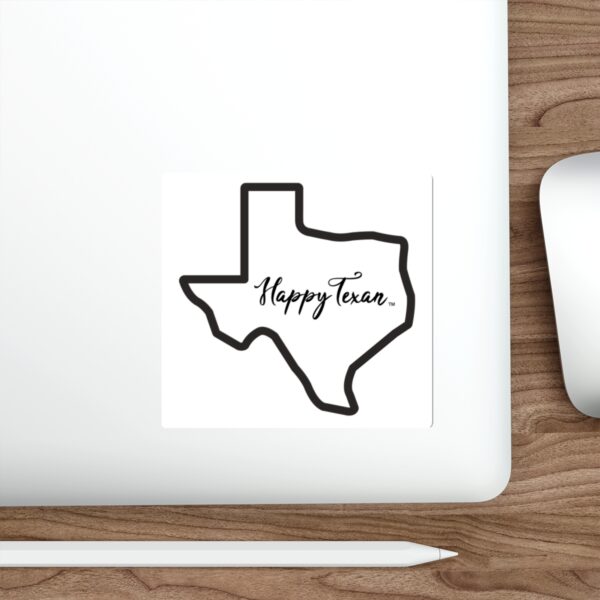 A laptop with a sticker of the state of texas.