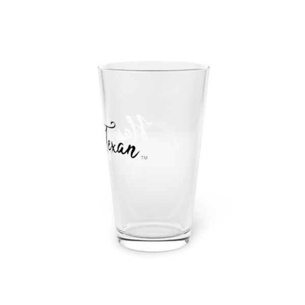 A glass with the word " woman " written on it.