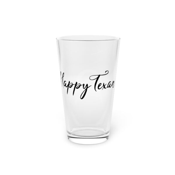 A glass with the words happy texas written on it.