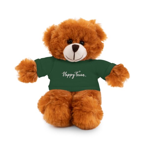 A brown teddy bear wearing a green shirt.