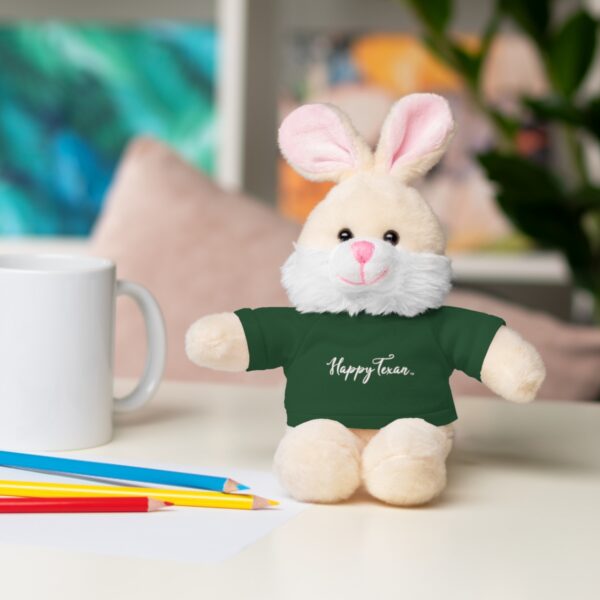 A stuffed bunny sitting on top of a table.