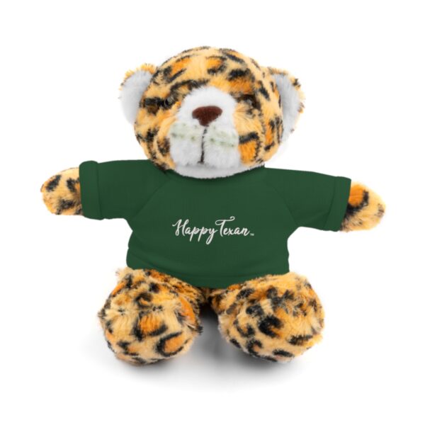 A stuffed animal that is wearing a t shirt.