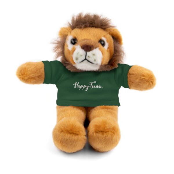 A stuffed lion wearing a green shirt