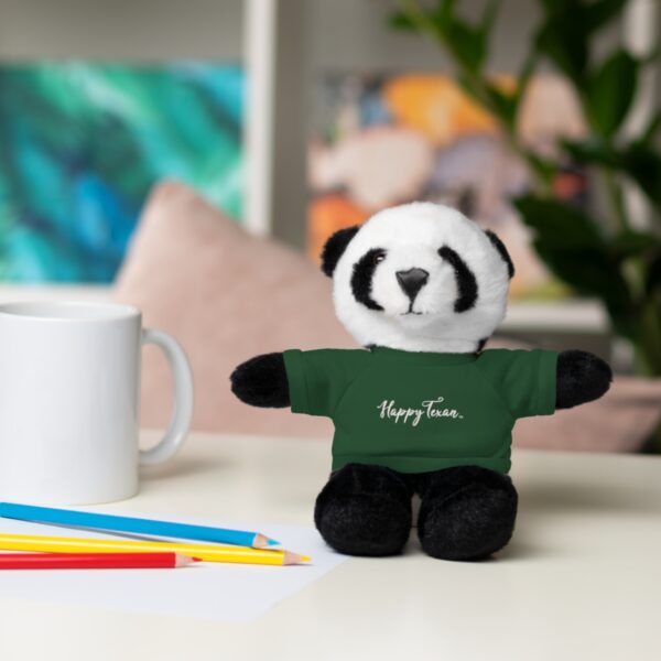 A panda bear sitting on top of a table.