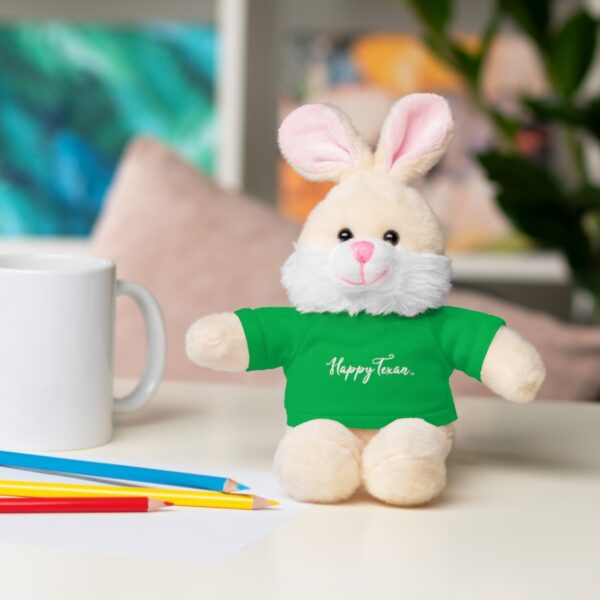 A stuffed bunny sitting on top of a table.