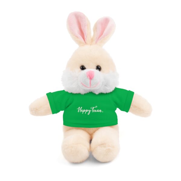 A stuffed bunny with a green shirt on it's head.