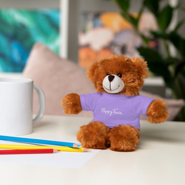 A teddy bear sitting on top of a table.