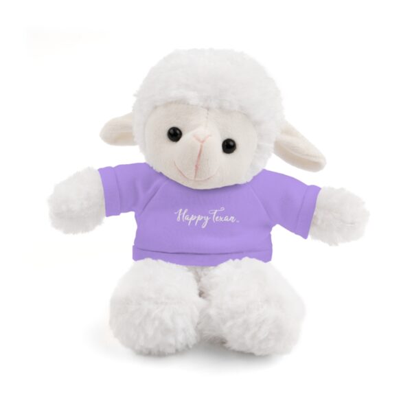 A stuffed animal with a purple shirt on it