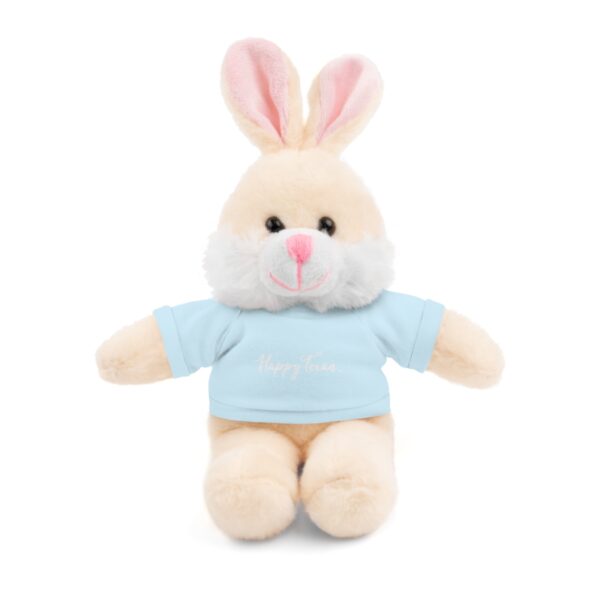 A stuffed bunny rabbit with a blue shirt.