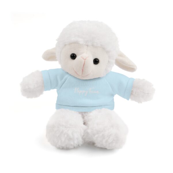 A white stuffed animal with a blue shirt on it