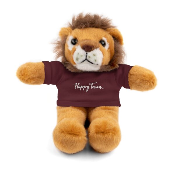 A stuffed lion wearing a t-shirt with the words " happy tears ".