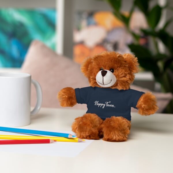 A teddy bear sitting on top of a table.