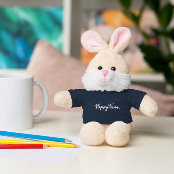 A stuffed bunny sitting on top of a table.