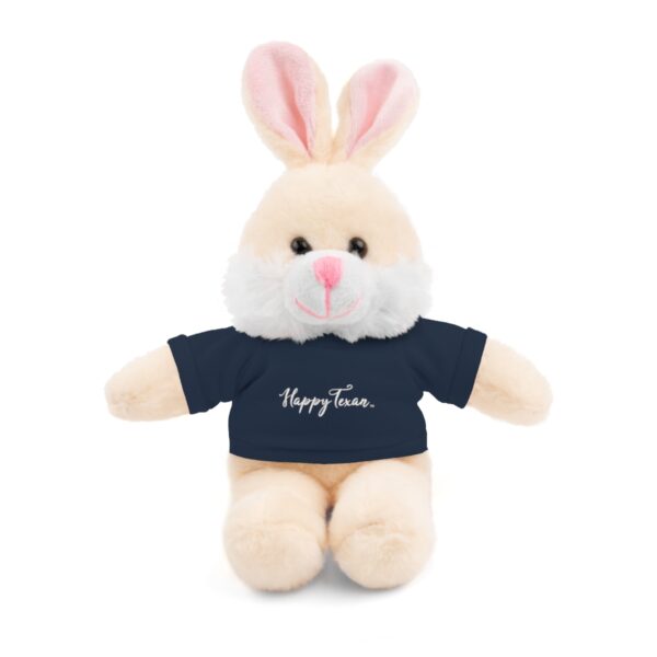 A stuffed bunny wearing a t-shirt with the words " happy easter ".