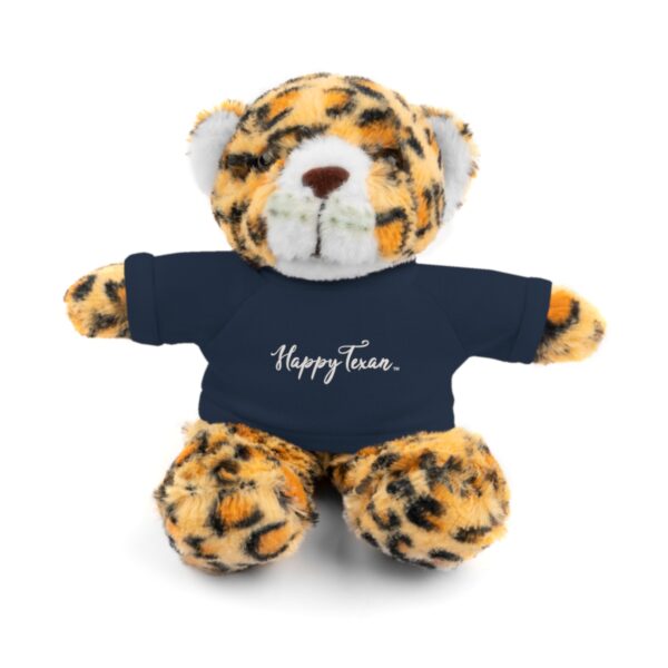 A stuffed animal that is wearing a t shirt.