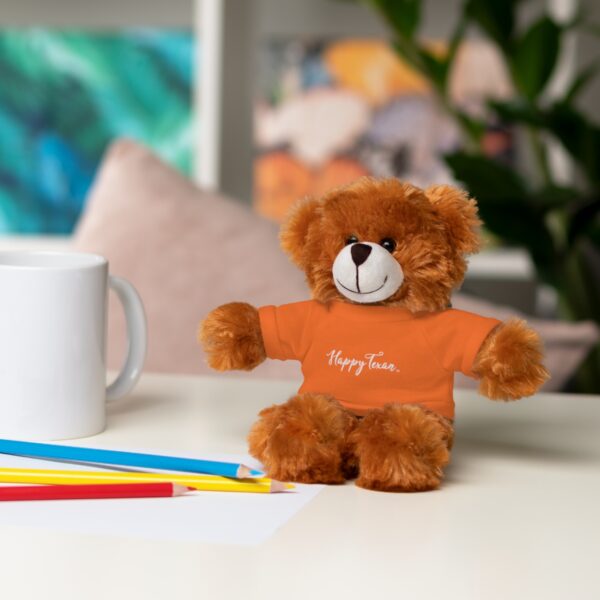 A teddy bear sitting on top of a table.