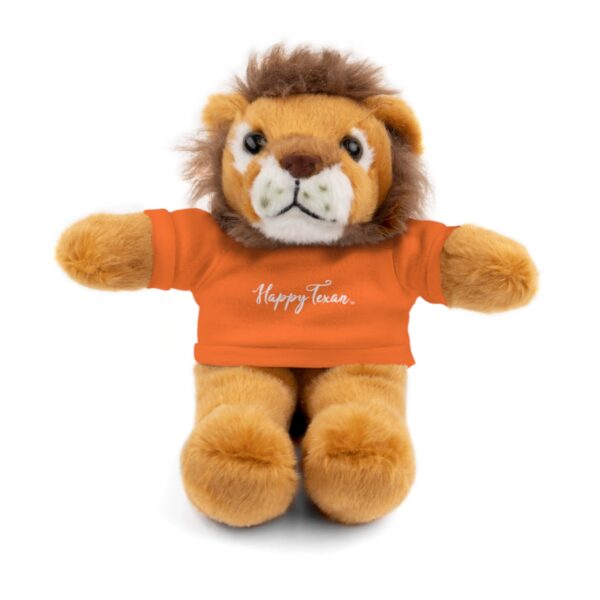 A stuffed lion with an orange shirt on.