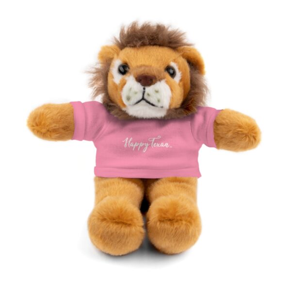 A stuffed lion with a pink shirt on