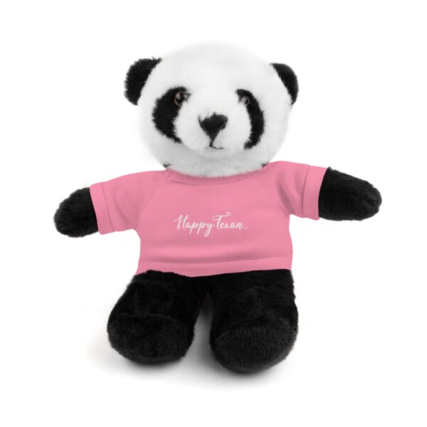 A stuffed panda bear wearing a pink shirt.