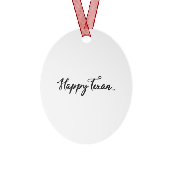 A white oval shaped ornament with the words " happy texas ".