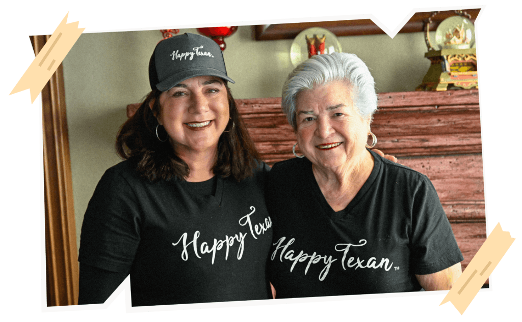 Two women wearing happy happy texan womens t-shirts.